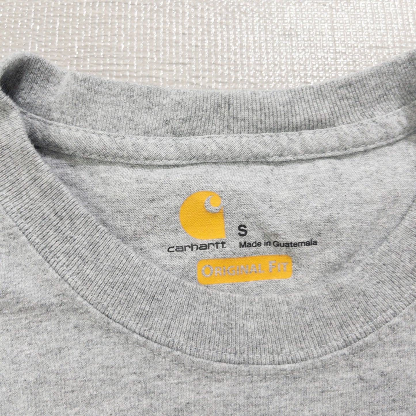 Used Carhartt T-shirts, 12-pack (S-XXL), pre-washed, bulk sale.