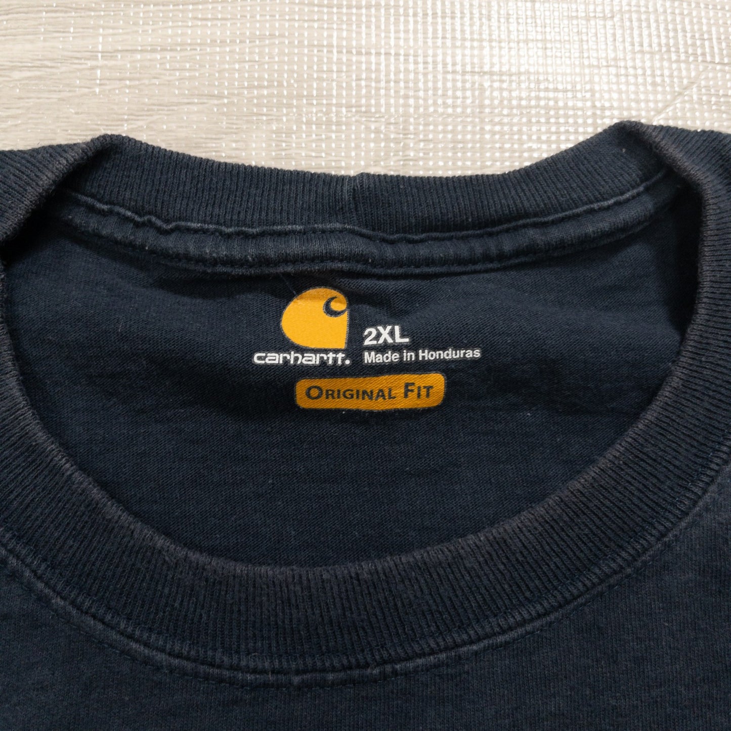 Used Carhartt T-shirts, 12-pack (S-XXL), pre-washed, bulk sale.
