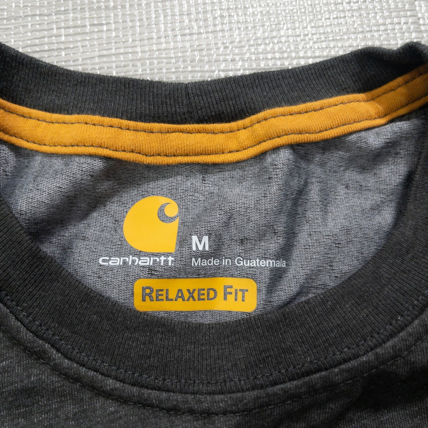 Used Carhartt T-shirts, 12-pack (S-XXL), pre-washed, bulk sale.