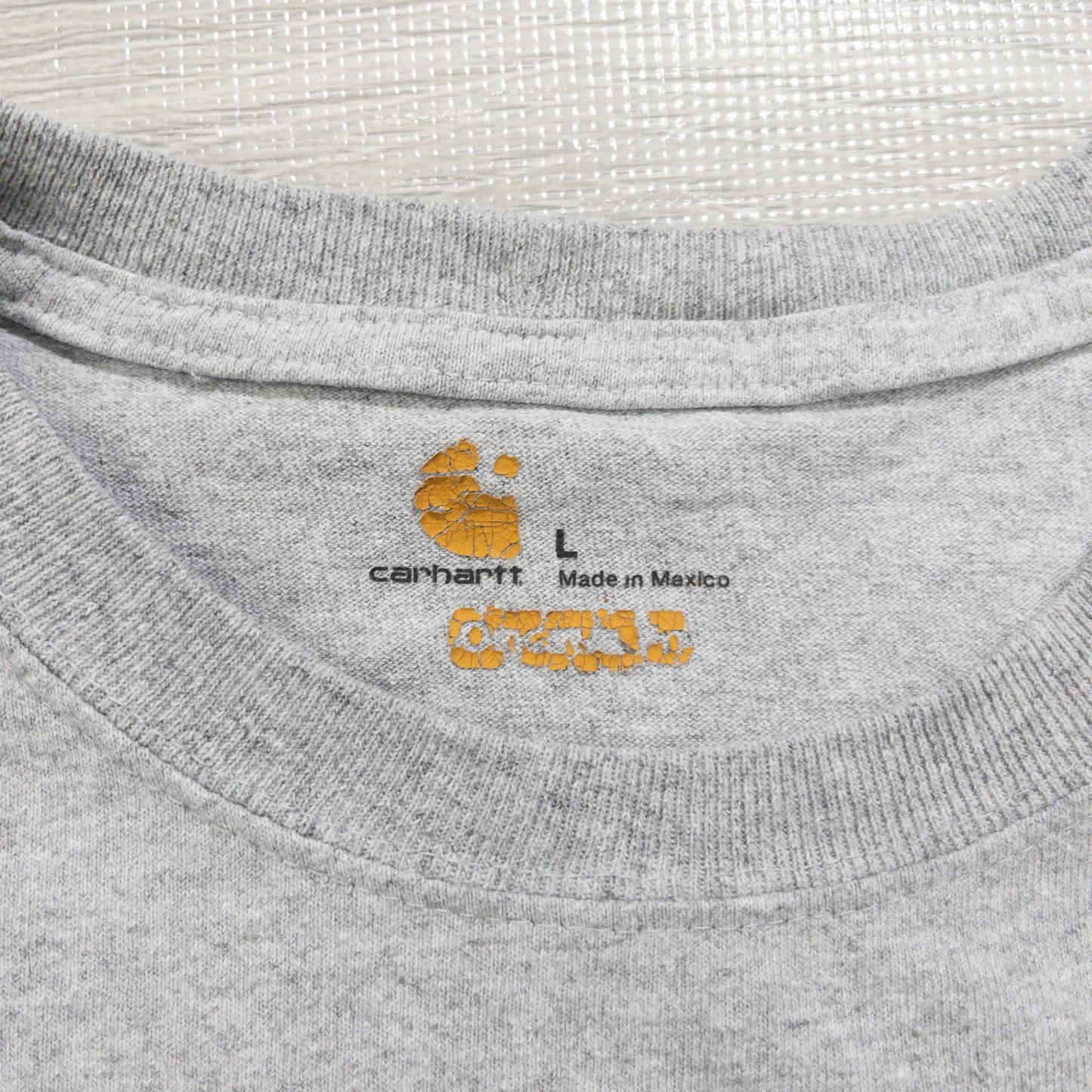 Used Carhartt T-shirts, 12-pack (S-XXL), pre-washed, bulk sale.