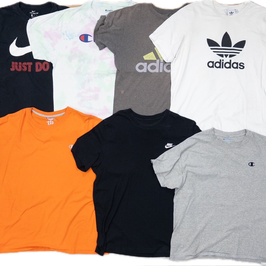 Used Clothing Wholesaler: Bulk Sale of Washed Short Sleeve T-Shirts (30-Count, Mixed Sports Brands) (S-XXXL) Champion, Nike, etc.