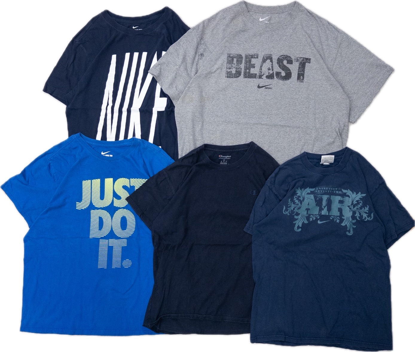 Used Clothing Wholesale: Bulk Sale of Washed Short Sleeve T-Shirts (20-Count, Mix of Sports Brands, Sizes S-XXL) from Nike, Champion, and More