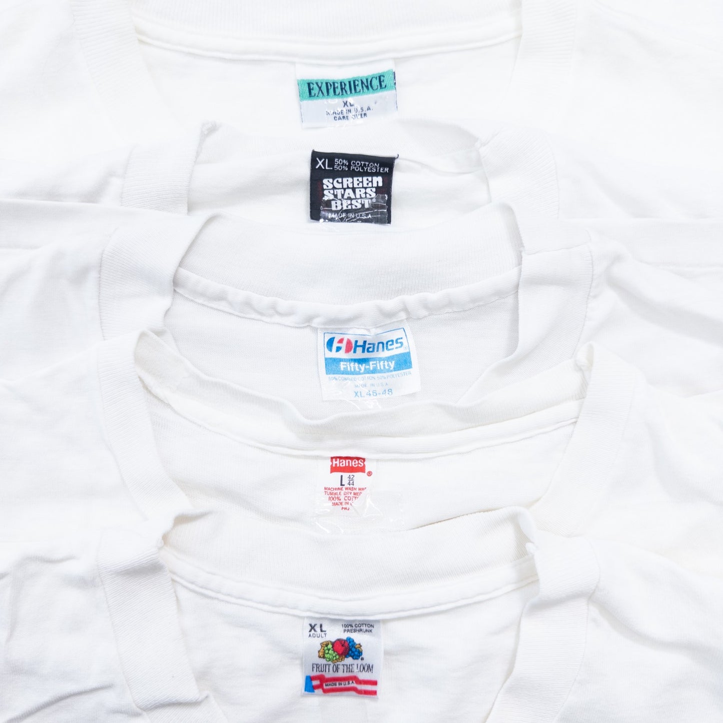Used clothing wholesale bulk sale: Washed 90s stained white and gray T-shirts, set of 20 (L-XXL)